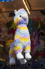 Llama, colourful stuffed animal at a lottery booth at the Bremer Osterwiese fair, Buergerweide,