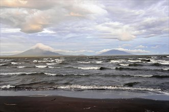 Underway near Rivas, Lake Nicaragua, Ometepe Island in the background, Nicaragua, Wave breaking on
