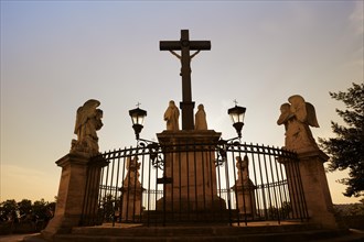 Jesus cross and angel statues, Avignon, Vaucluse, Provence-Alpes-Cote d'Azur, South of France,