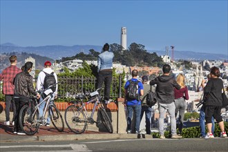 Tourists on Russian Hill with a view of Telegraph Hill, San Francisco, California, USA, San