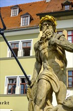 The Neptune Fountain in front of the Hofapotheke, market square in Weimar, Thuringia, Germany,