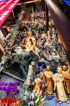 Jade Buddha Temple, Shanghai, Complex multi-layered wooden sculpture with Buddha statues and