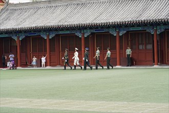 China, Beijing, Forbidden City, UNESCO World Heritage Site, A line of marching soldiers in front of
