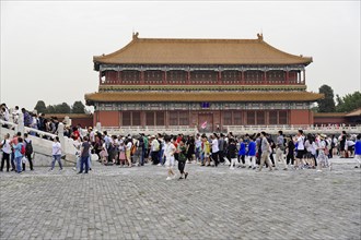 China, Beijing, Forbidden City, UNESCO World Heritage Site, crowd gathered in an area of the