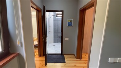 Entrance to a new house with a glass door. Nobody inside