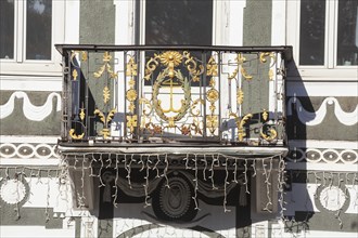 Old, decorated balcony at the old pharmacy on Marienplatz, district of Garmisch,