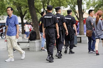 China, Beijing, Forbidden City, UNESCO World Heritage Site, A group of security guards patrols on