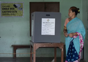 BOKAKHAT, INDIA, APRIL 19: A women casts her vote during the first phase of the India's general