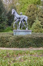 Bronze sculpture The Horse Steer by the sculptor Louis Tuaillon in the Wallanlagen Park in Bremen,