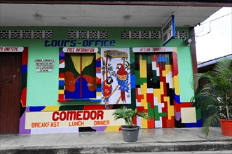 Ometepe Island, Nicaragua, Painted wall of a tourist office with tropical motifs and colourful