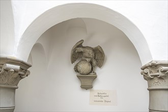 Restored original of the sculpture of the imperial eagle from 1721 from the town hall gable of the