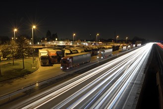 Traces of light on the A2 motorway and Bottrop service area, night shot, long exposure, Bottrop,