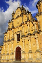 Church La Recoleccion, 1786, Leon, Nicaragua, Baroque church facade in warm sunlight, Baroque