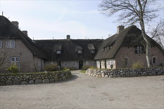 Sylt, North Frisian Island, Schleswig Holstein, Complex of thatched roof houses with stone walls