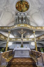 Altar with crucifix and organ loft, Dreifaltigkeitskirche, Kaufbeuern, Allgaeu, Swabia, Bavaria,