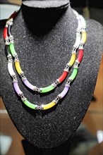 Xian, Shaanxi Province, China, Asia, A colourful necklace presented in a jewellery showcase, luxury