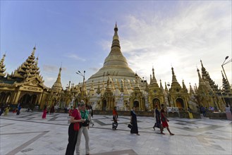 Shwedagon Pagoda, Yangon, Myanmar, Asia, People gather at Shwedagon Pagoda at dusk, Asia