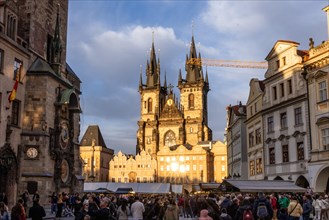 Crowds, sightseeing, city tour, sunshine, pedestrian zone, historical, old, city hall Prague,