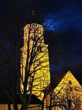 St Martin's Church in Illertissen by night and moonlight. Illertissen, Swabia, Bavaria, Germany,