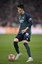 Takehiro Tomiyasu FC Arsenal (18) Action on the ball, Allianz Arena, Munich, Bavaria, Germany,