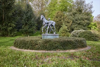 Sculpture Der Rosselenker by the sculptor Louis Tuaillon in the Wallanlagen park in Bremen,