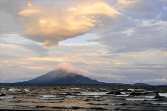 Lake Nicaragua, Ometepe Island in the background, Nicaragua, The sunset colours the sky and lake