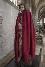 Life-size, carved figure of Jesus with a red cloak, 350-year-old processional figure in St
