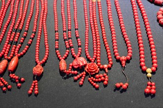 Chongqing, Chongqing Province, China, Asia, Various red, elaborately decorated necklaces and pieces