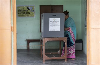 A women casts her vote during the first phase of the India's general elections on April 19, 2024 in