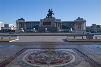 Mongolian government palace, state palace, parliament building with statue of Genghis Khan in the