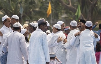 GUWAHATI, INDIA, APRIL 11: Muslims greets each other after perform Eid al-Fitr prayer at Eidgah in