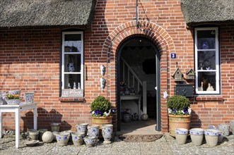House entrance, Keitum, Sylt, North Frisian Island, brick building with thatched roof and a