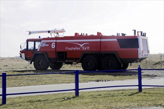 Sylt Airport, Sylt, North Frisian Island, Schleswig-Holstein, Red fire engine on an airport site