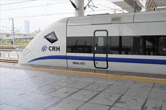 Express train CRH380 to Yichang, close-up of a closed door of a high-speed train on the platform,