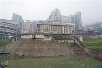 Yichang, Hubei Province, China, Asia, View of an urban construction site next to a dried-up