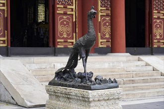 New Summer Palace, Beijing, China, Asia, A traditional peacock sculpture in front of the steps of a