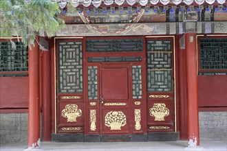 New Summer Palace, Beijing, China, Asia, Traditionally decorated red door in Chinese style, symbol