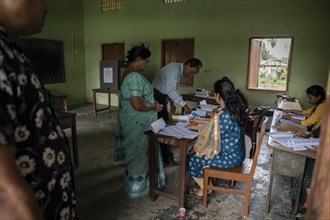BOKAKHAT, INDIA, APRIL 19: Voters at a polling station to cast their votes during the first phase