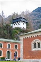 Observation tower on a hill with a rear building and surrounding nature, Bad Reichenhall, Bavaria,