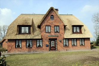 Sylt, North Frisian Island, Schleswig Holstein, Impressive large brick house with thatched roof and