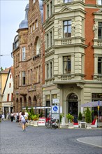 Everyday busy street scene in Frauentorstrasse in the historic city centre of Weimar, Thuringia,