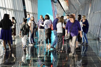 Viewing terrace, The Bottle Opener at 492 metres, A group of people stand in a modern glass