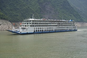 Chongqing, Chongqing Province, Cruise ship on the Yangtze River, A multi-storey cruise ship glides