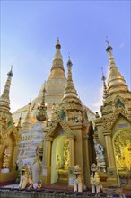 Shwedagon Pagoda, Yangon, Myanmar, Asia, Detailed view of several golden stupas and statues at the