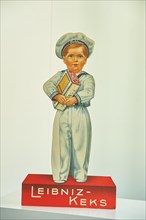 Painted cardboard advertising figure for Leibniz biscuits I Administration of Bahlsen GmbH & Co. KG