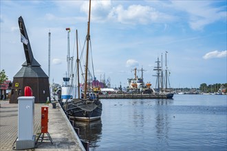 Picturesque everyday scene in the city harbour of Rostock, Mecklenburg-Western Pomerania, Germany,