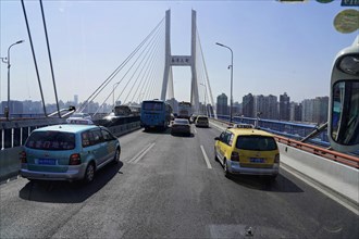 Traffic in Shanghai, Shanghai Shi, People's Republic of China, Traffic on a city bridge with