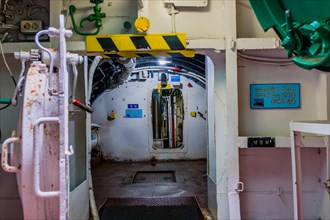 Iron doorway and interior of aft section of submarine on display at Unification Park in Gangneung,
