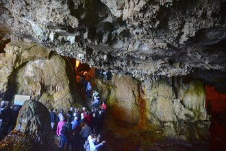 Visitors in Grotta Nereo cave in Capo Caccia cliff, Alghero, Sassari Province, Sardinia, Italy,