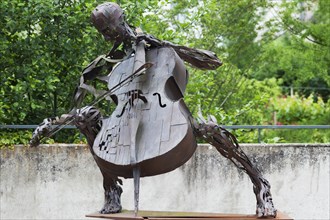 Metal sculpture, man with a cello, Langeais, France, Europe